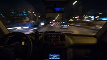 Timelapse of driving car in night city Thessaloniki, Greece