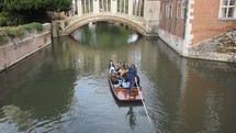 CAMBRIDGE, UK - CIRCA OCTOBER 2018: Punting on River Cam 