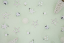 white ornaments on mint green 