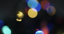 Abstract Christmas tree lights bokeh, blurred, holidays motion background.