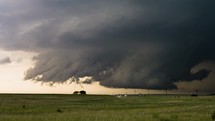 Terrifying Storm Base Quickly Builds Above a Busy Highway in Kansas.