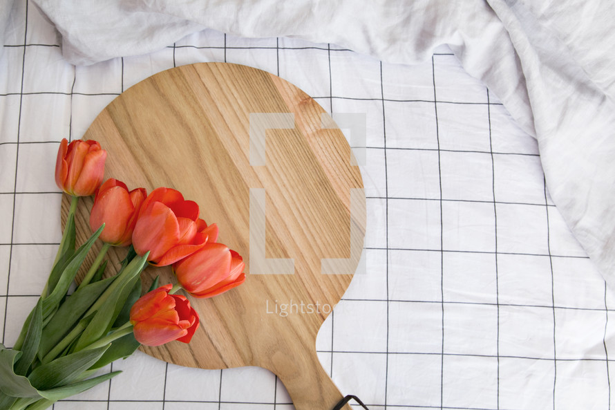 tulips on a wood tray 