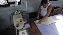 Making Clothes Tracing Measurments Onto Cloth Asian Man Asia