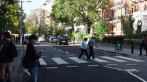 LONDON, UK - CIRCA OCTOBER 2022: Abbey Road zebra crossing made famous by the 1969 Beatles album cover - EDITORIAL USE ONLY