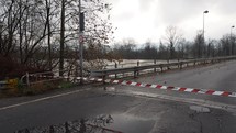 River Po flood in Settimo Torinese under a bridge near Turin, Italy (polizia municipale means local police line)