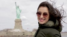 Portrait Of Happy Tourist Woman With Flying Hair Enjoying New York Skyline
