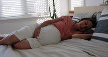 Third trimester Pregnant woman taking a nap