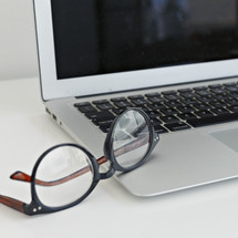 reading glasses and laptop computer 
