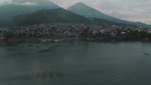 Flying Towards Santiago Atitlán In Guatemala During Sunrise - aerial drone shot	