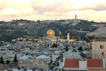 he Dome of the Rock and the Mount of Olives near sunset.