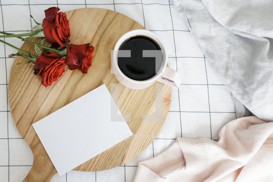 coffee mug, red roses, bed, sheets, wood board, red roses, sweater, breakfast in bed, envelope