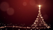 Christmas tree with particles lights stars and snowflakes on red. Holidays concept background