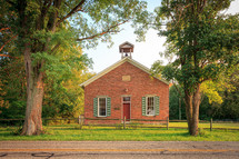 Exterior of old brick one room schoolhouse