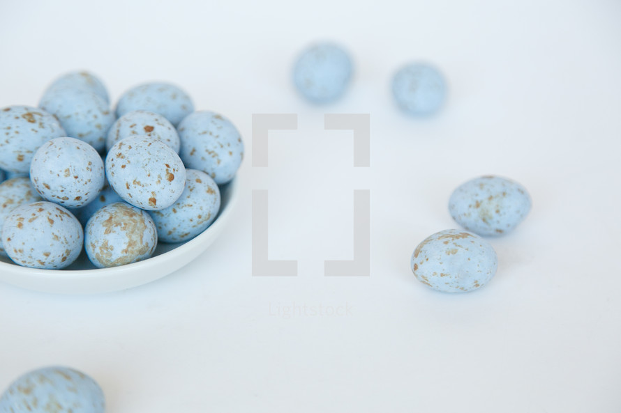speckled blue eggs in a bowl