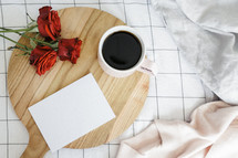 coffee mug, red roses, bed, sheets, wood board, red roses, sweater, breakfast in bed, envelope
