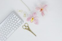 eiffel tower, gold, clips, scissors, keyboard, pencils, keypad, computer, desk, white background orchids, pink 
