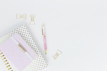 pink, polka dot, notebooks, journal, white background, pen, desk, paper clips 
