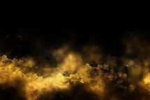 Abstract Gold Dust Over Black Background