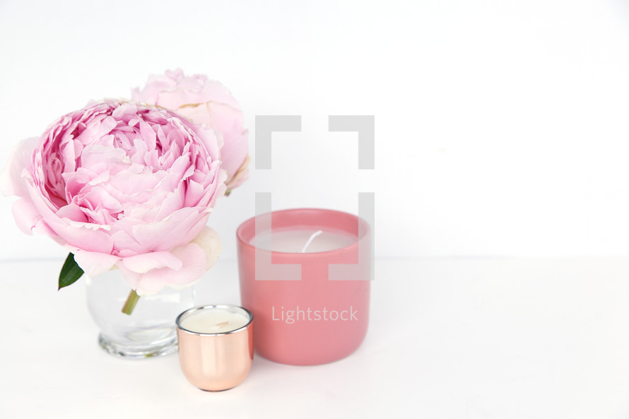 pink peony and candles 