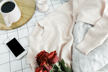 sweater, roses, sheets, linens, bed, bedding, bedspread, iphone, planner, journal, pencil, reading glasses, candle, coffee mug, grid