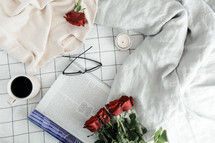 bedspread, red roses, linens, coffee mug, breakfast in bed, reading glasses, sweater, sheets, candle, book