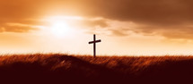 A Cross with Yellow Field with Sun Behind