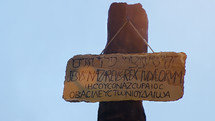 Wooden cross representing Sacrifice of Jesus Christ from Calvary hill. Detail shot
