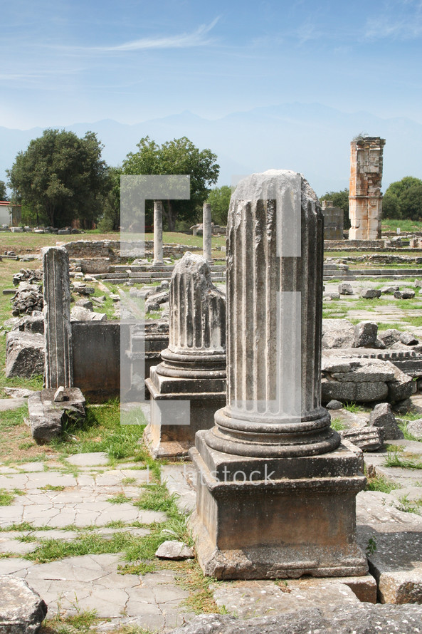 Corinthian column looking across Agora to Basilica B. Remains from historic Philippi that would have been visited by the Apostle Paul, Silas, Lydia and early Christians from Acts 16. These remains are near the Agora of Philippi.