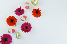 gerber daisies and gold Easter eggs 