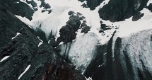 Glaciar Vinciguerra In Rocky Mountain Peak, Ushuaia, Tierra del Fuego, Argentina - Aerial Drone Shot