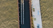 Aerial View Of Old Rusty Boats Moving In The Water