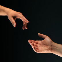reaching hands 