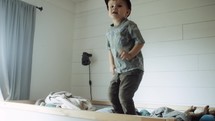 toddler boy on a bunkbed 