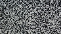 vintage black and white tv static noise useful as a background