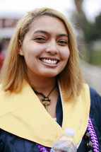 a smiling graduate 
