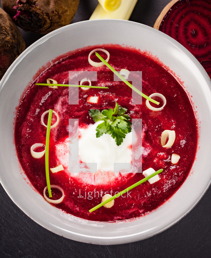 Beetroot, red borscht with sour cream, leek, chives and parsley