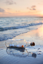 Message in a bottle washed up on shore.
