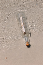Message in a bottle on a beach