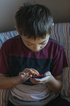 Boy On Electronic Device