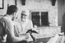 men reading the Bible at a bible study