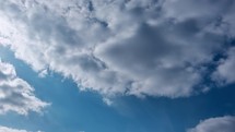 White clouds in the blue sky, timelapse
