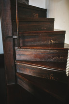 narrow wood staircase
