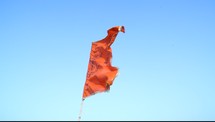 orange flag blowing