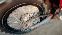 Motocross wheel walks on dirt road