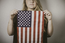 woman holding an American flag