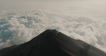 Fuego active volcano in Guatemala. Aerial tilt down	