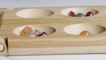 Mancala board game wooden table