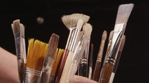 cup of paint brushes 