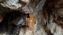 Old church inside a Cavern with artistic Crucifix 