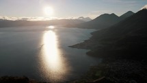 Beautiful sunrise view of Lake Atitlan, San Pedro town and the volcanoes surrounding in Guatemala	